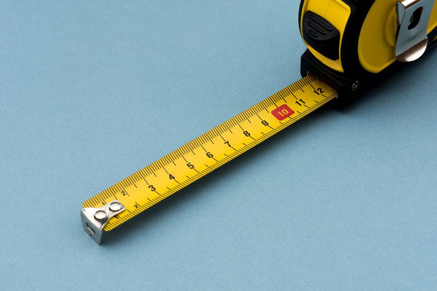 The Real Reason The Tip Of Your Tape Measure Wiggles Like That