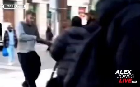 Watch As A Horde Of Illegal Aliens Celebrate As Security Forces Tackle And Abuse An Indigenous White Man After His Head Was Smashed Open By An African Invader