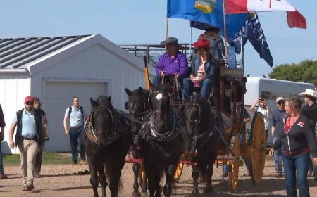 Canada, Alberta flags fly high at town parade during separatism debate