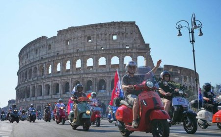 Thousands of Vespas swarm Rome’s historic centre to mark iconic scooter’s 80th anniversary