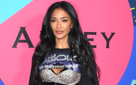 Nicole Scherzinger flaunts toned abs in blue bikini during birthday beach vacation