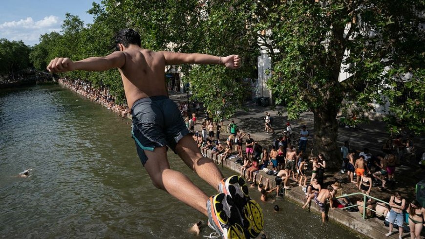 Popular city bans public alcohol amid heat wave as people take risks to cool down