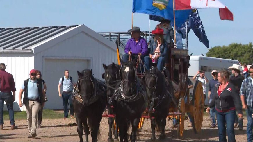 Canada, Alberta flags fly high at town parade during separatism debate