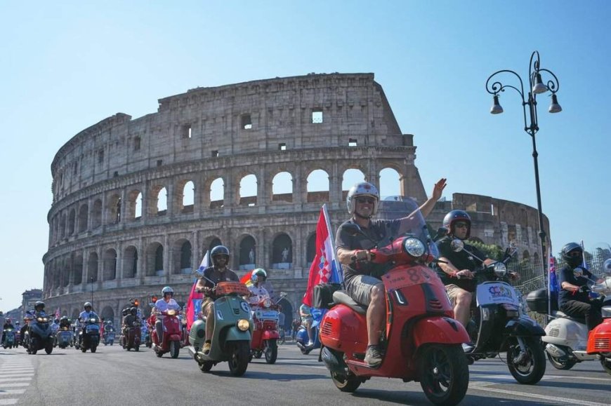 Thousands of Vespas swarm Rome’s historic center to mark iconic scooter’s 80th anniversary