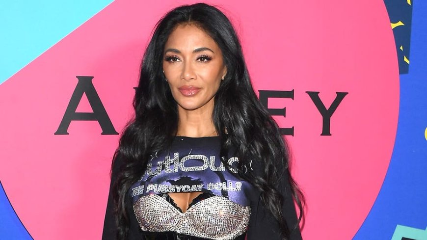 Nicole Scherzinger flaunts toned abs in blue bikini during birthday beach vacation
