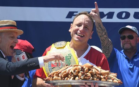 Legendary Joey Chestnut wins 18th Nathan's Hot Dog Eating Contest by downing 66 wieners and buns