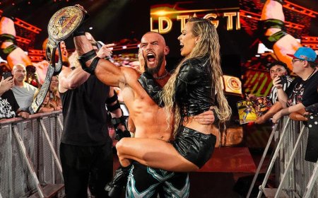 WWE's Maxxine Dupri helps Austin Theory and Bron Breakker win World Tag Team Championship, seals win with kiss