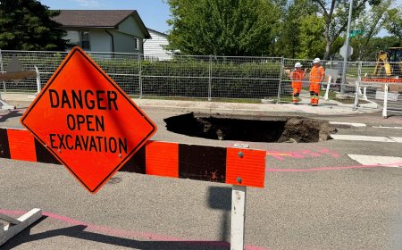 Deep sinkhole opens up in north Edmonton after weekend thunderstorms