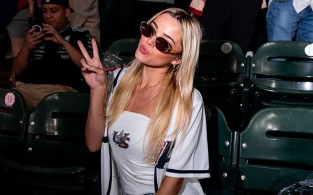 Livvy Dunne serves up foamy beers at the Home Run Derby & Hannah Barron goes bikini bowfishing