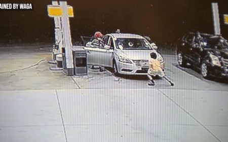 Georgia mother fights off alleged child snatcher with gas pump in surveillance video