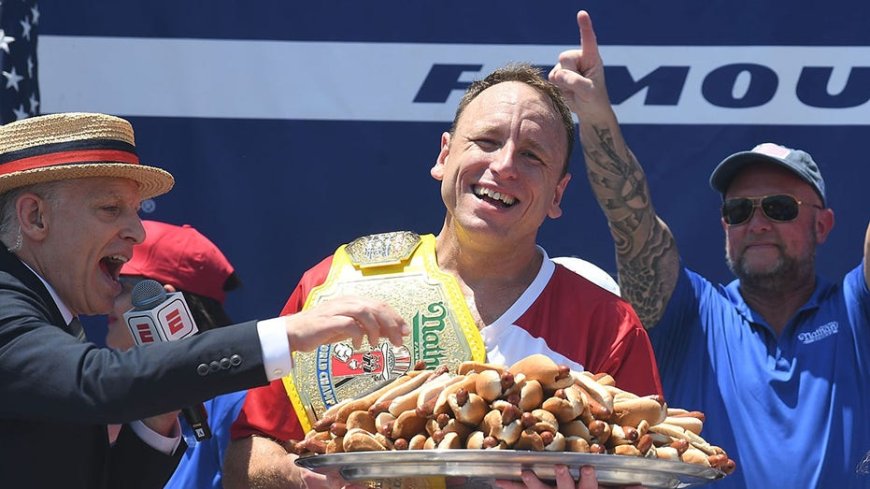 Legendary Joey Chestnut wins 18th Nathan's Hot Dog Eating Contest by downing 66 wieners and buns