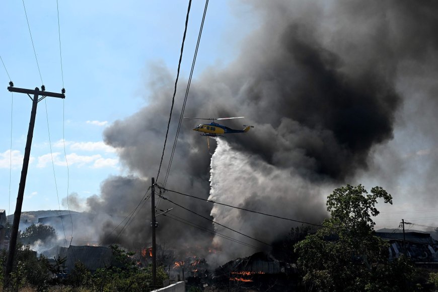 Wildfires rage in Portugal, Greece and Spain while Greek authorities warn of toxic smoke