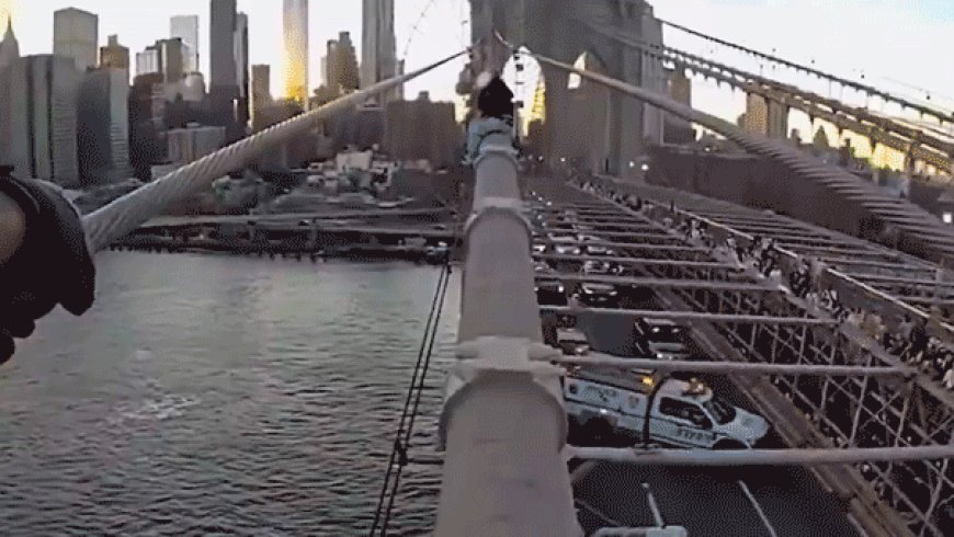 Dramatic bodycam video captures NYPD officer rescuing woman from top of Brooklyn Bridge after emotional plea
