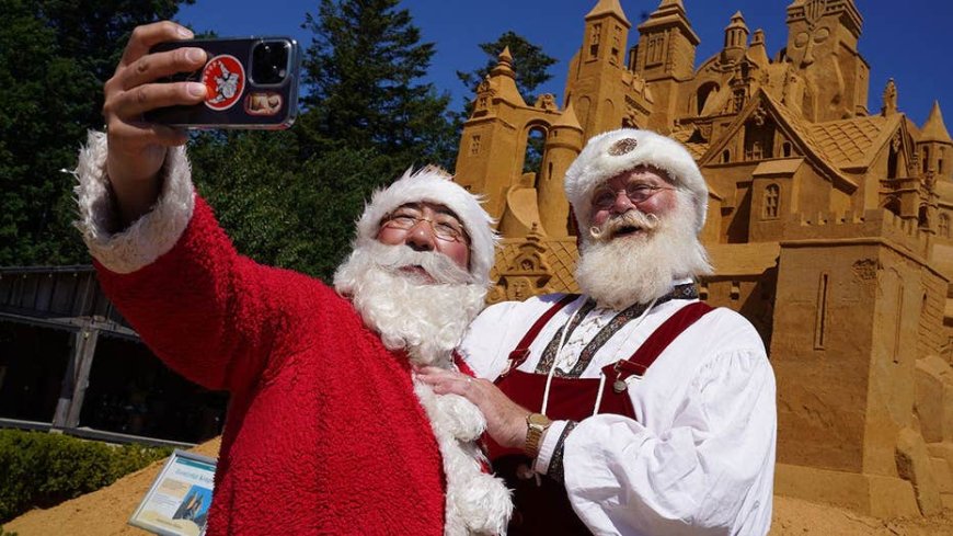 It's Christmas in July as hundreds of Santas go on the march in the middle of a stifling summer heat wave