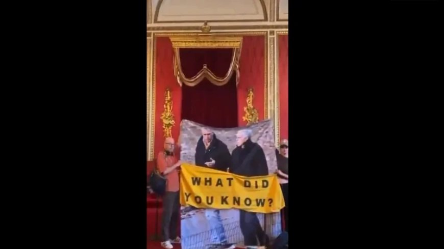 “What Did You Know?” – Protesters Unfurl Massive Photo Of Prince Andrew With Jeffrey Epstein Inside Buckingham Palace Throne Room 