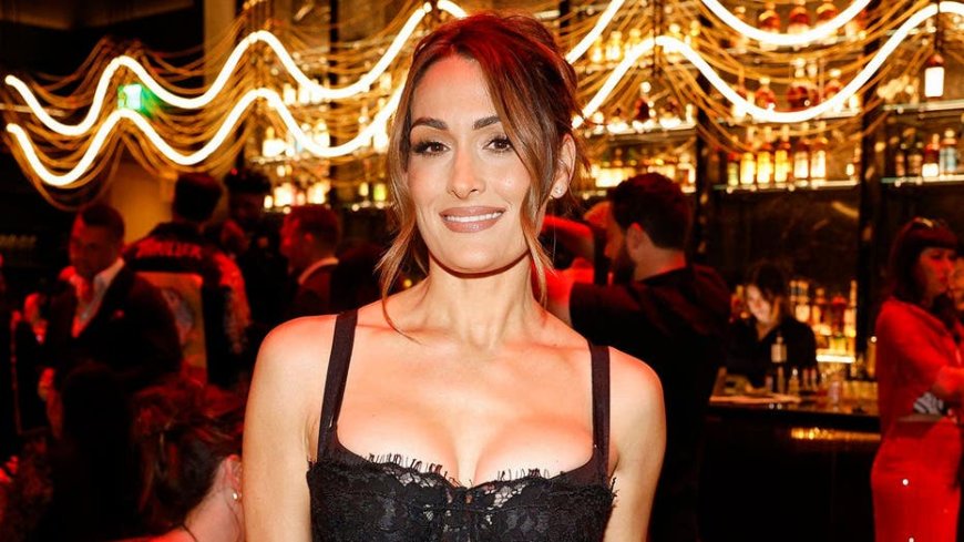 Nikki Bella throws out the bat signal again and says she's still willing to risk it all for Batman