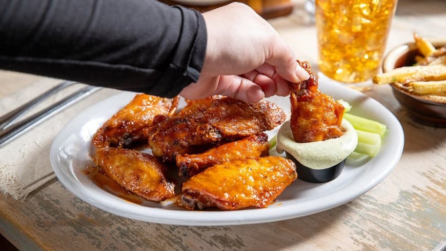 Chicken wing prices are down — here's why your favorite restaurant may not cut prices