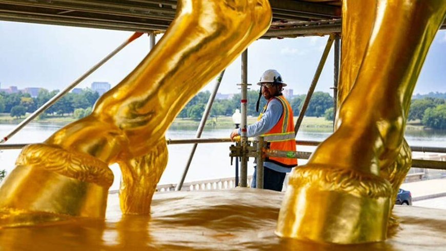 Trump unveils gleaming gold makeover of iconic DC horse statues