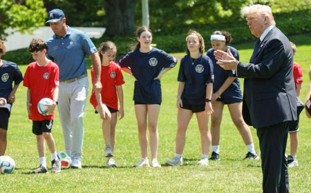 Pat McAfee attends sporting event with President Trump wearing jeans and a backwards cap