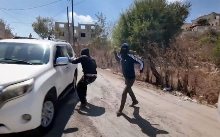 Masked Israeli settlers attack NBC News crew and Palestinian family in West Bank