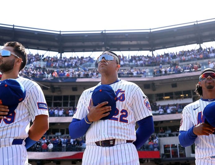 Sneaky raccoon seen helping itself to ballpark fare at Citi Field as bewildered Mets fans look on