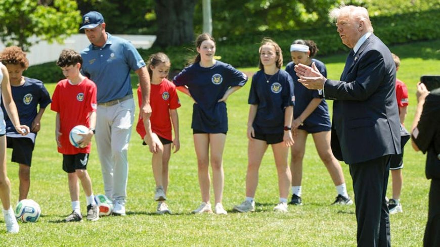Pat McAfee attends sporting event with President Trump wearing jeans and a backwards cap