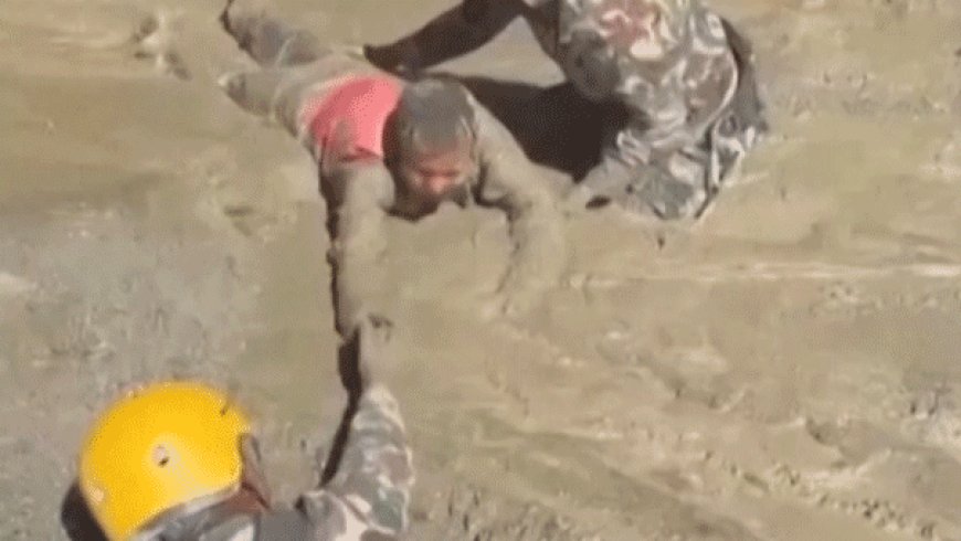 Trapped Nepali workers pulled from hydropower tunnel after catastrophic flooding