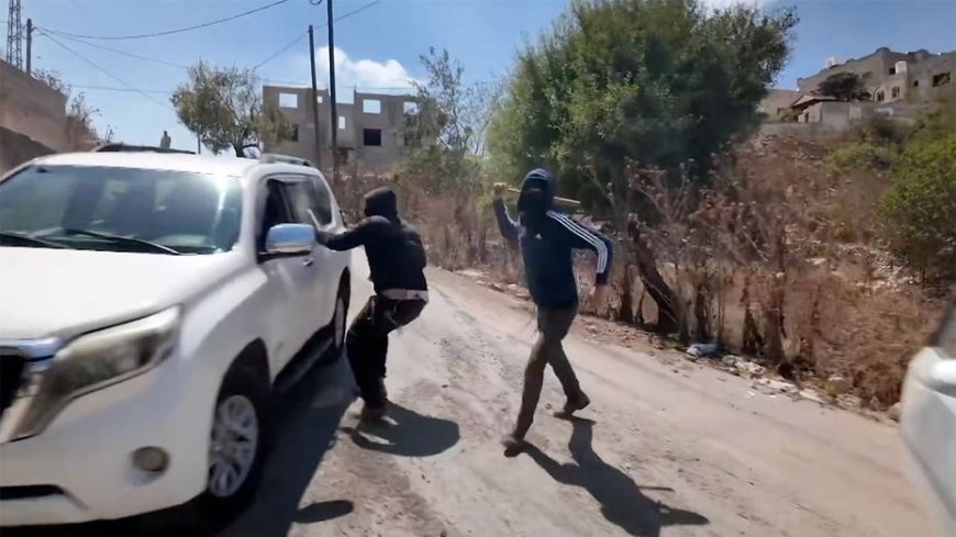 Masked Israeli settlers attack NBC News crew and Palestinian family in West Bank