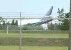 Amazon cargo plane overruns Miami airport runway, striking 'multiple' vehicles and catching fire