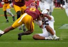 Oregon Ducks QB Dante Moore carted off the field after a vicious hit to the head against USC