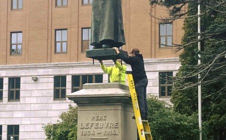 Century-old statue returned to its base in Memramcook, N.B. after vandalism