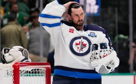 Winnipeg Jets suspend Connor Hellebuyck after he fails to report to training camp