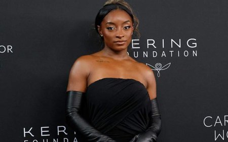 Simone Biles says 3 masked men broke into her Chicago home, stole Porsche