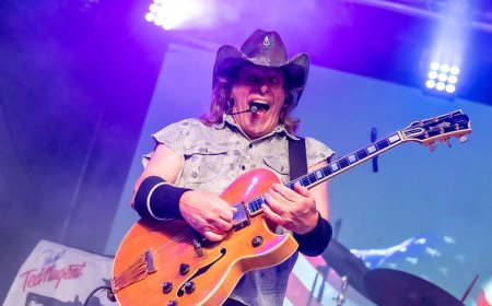 Ted Nugent proves he still lives up to Motor City Madman moniker as he poses with massive buck