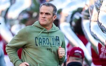 Which college football coaches improved or tanked their hot seat status four games into the season?