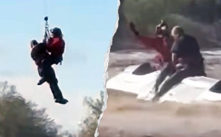 Arizona sheriff's helicopter crew rescues man stranded atop overturned truck in rapidly rising floodwaters