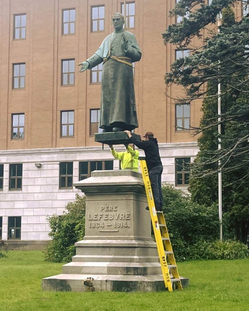 Century-old statue returned to its base in Memramcook, N.B. after vandalism