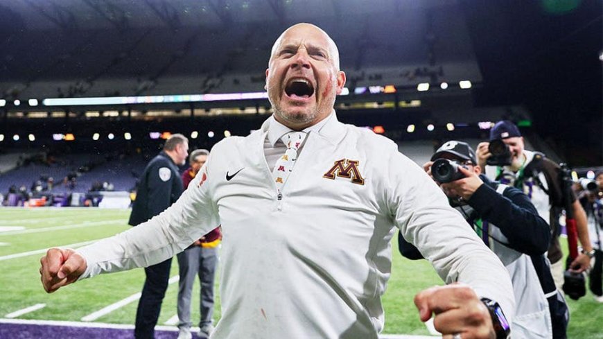 Minnesota coach PJ Fleck wipes player's blood all over his face after Gophers win over Washington