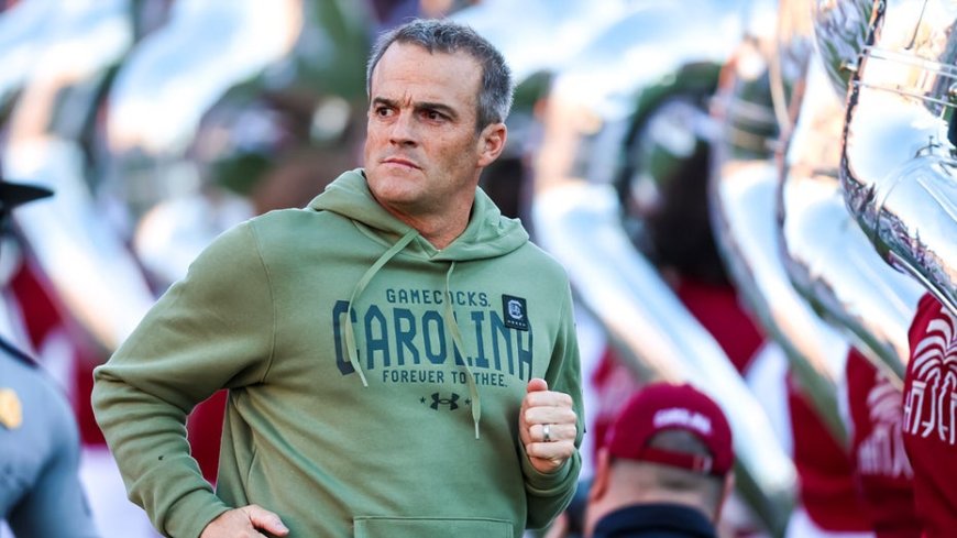 Which college football coaches improved or tanked their hot seat status four games into the season?