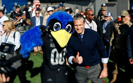 Pete Hegseth handles Air Force-Navy coin toss after showing off basketball skills at Academy