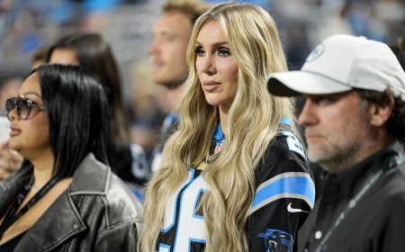 WWE star Charlotte Flair struts into Panthers' stadium, bangs the drum before game vs Lions