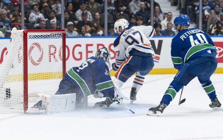 McDavid comes up big as Oilers down Canucks 9-7