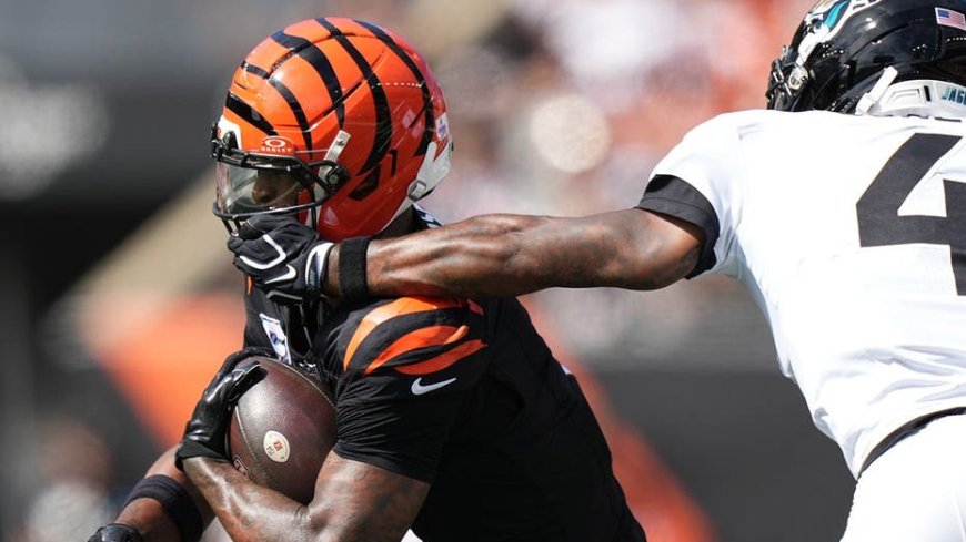 Bengals' Ja'Marr Chase suffers concussion after getting his facemask pulled and taking huge hit