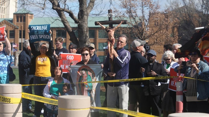 Iowa city council meeting erupts after former member opens meeting with satanic prayer and 'Hail Satan'
